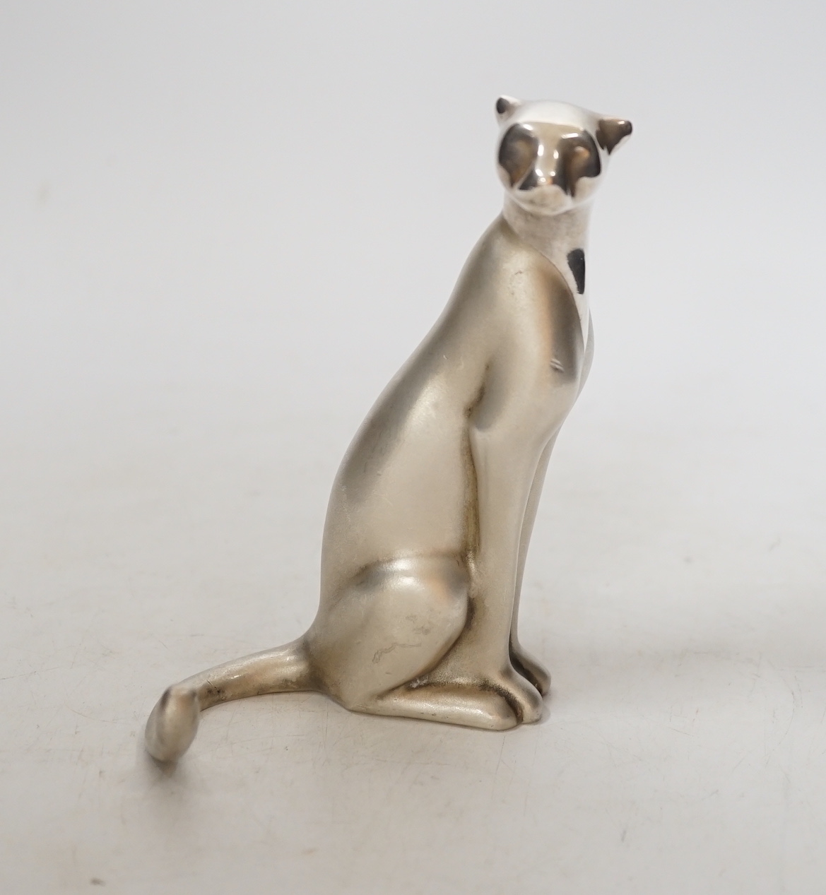 A recent Dutch white metal (etched '.999 Fine') model of a cheetah, by Loet Vanderveen, Rotterdam, height 13cm